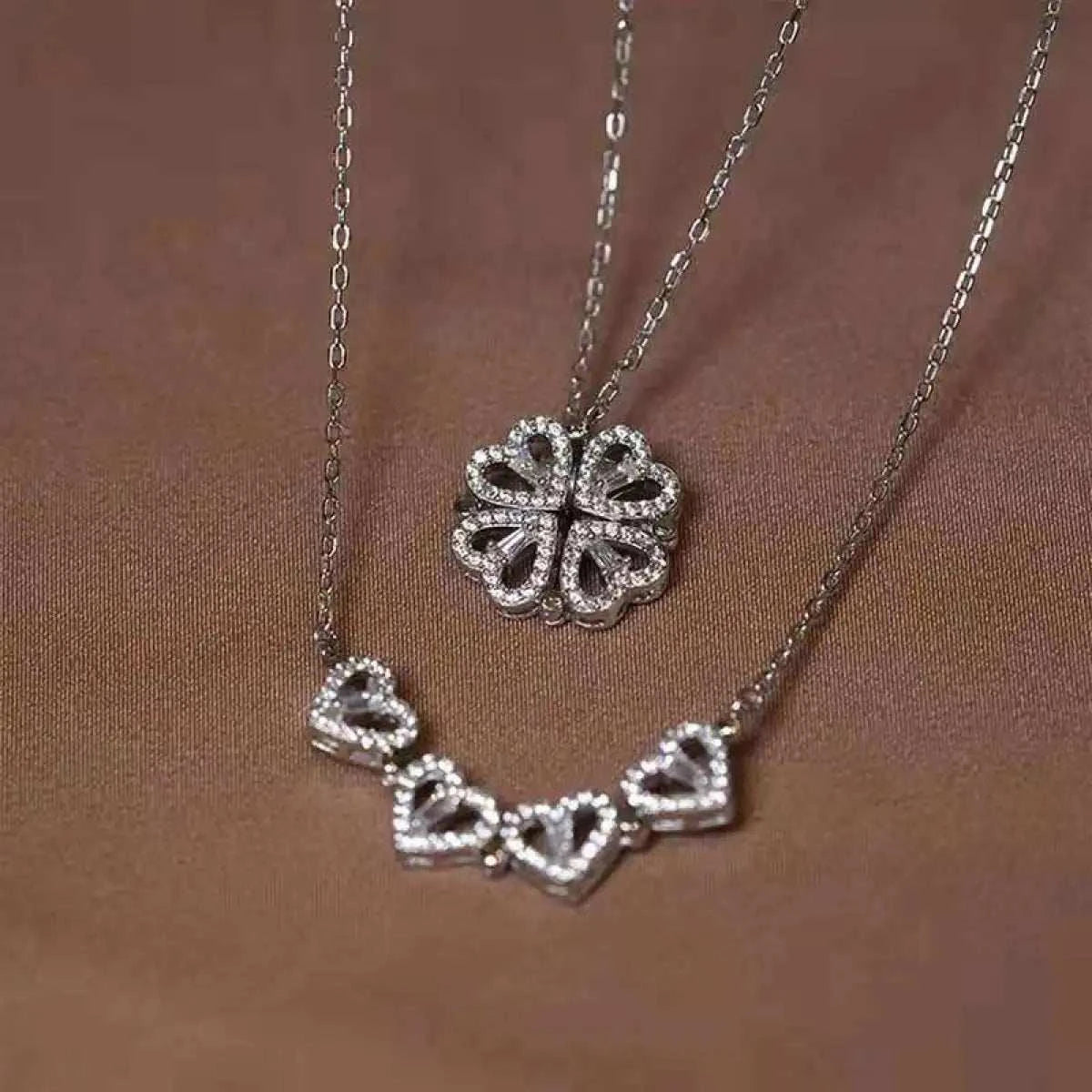 Charming double-wear necklace featuring lucky four-leaf clover design